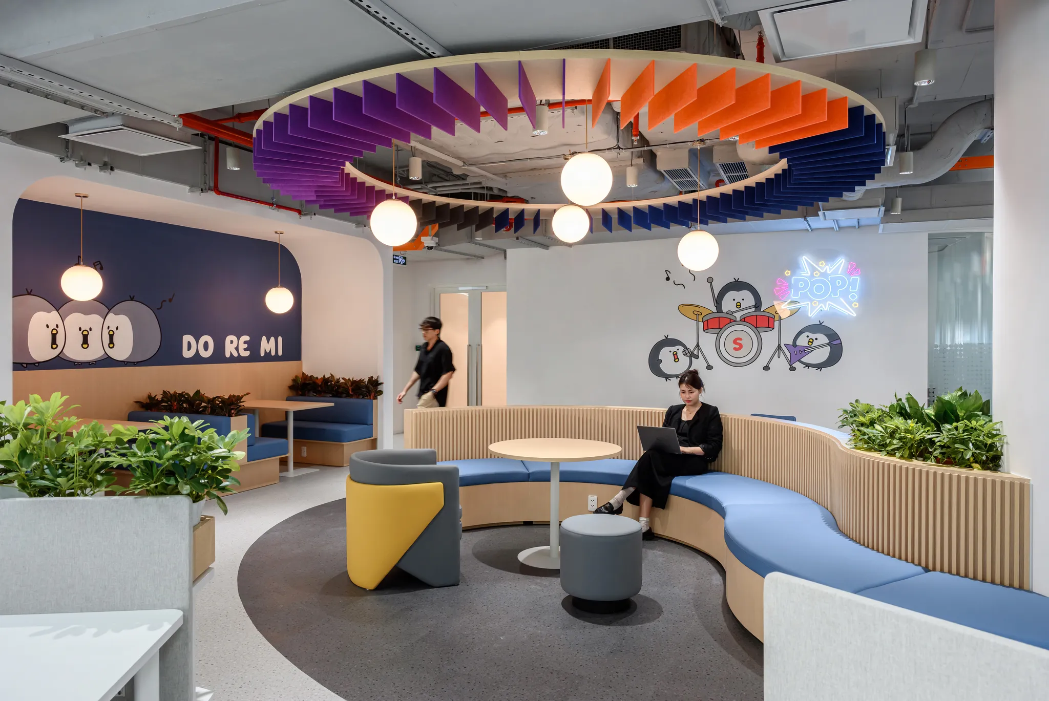 <figcaption>Plants are strategically arranged throughout the Shinhan office, creating a fresh and inspiring workspace for employees.</figcaption>